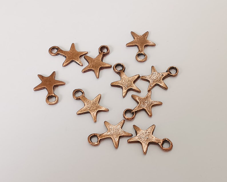 20 Star charms Antique copper plated charms (15x12mm) G25155