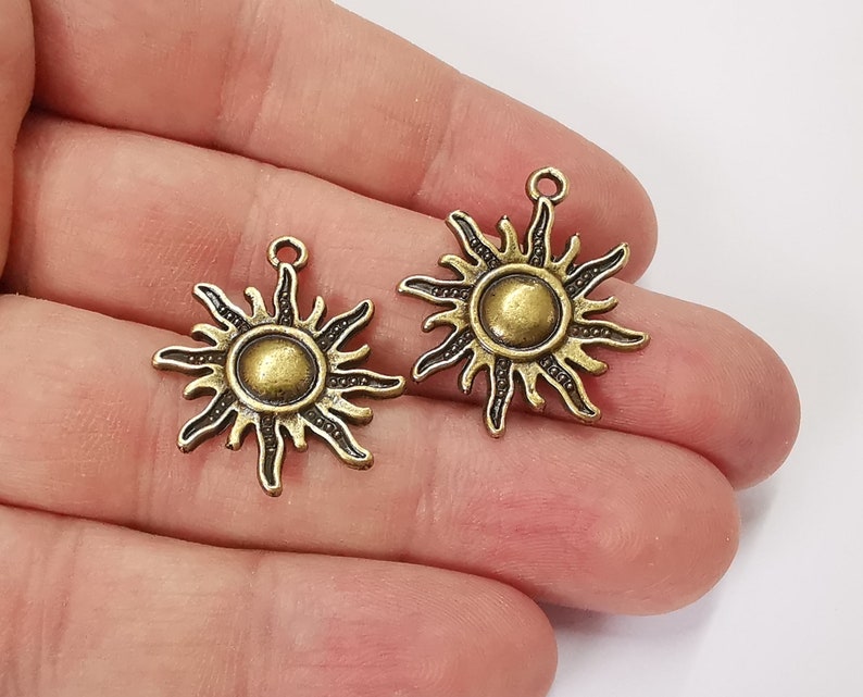 10 Sun charms Antique bronze plated charms (27x23mm) G25221