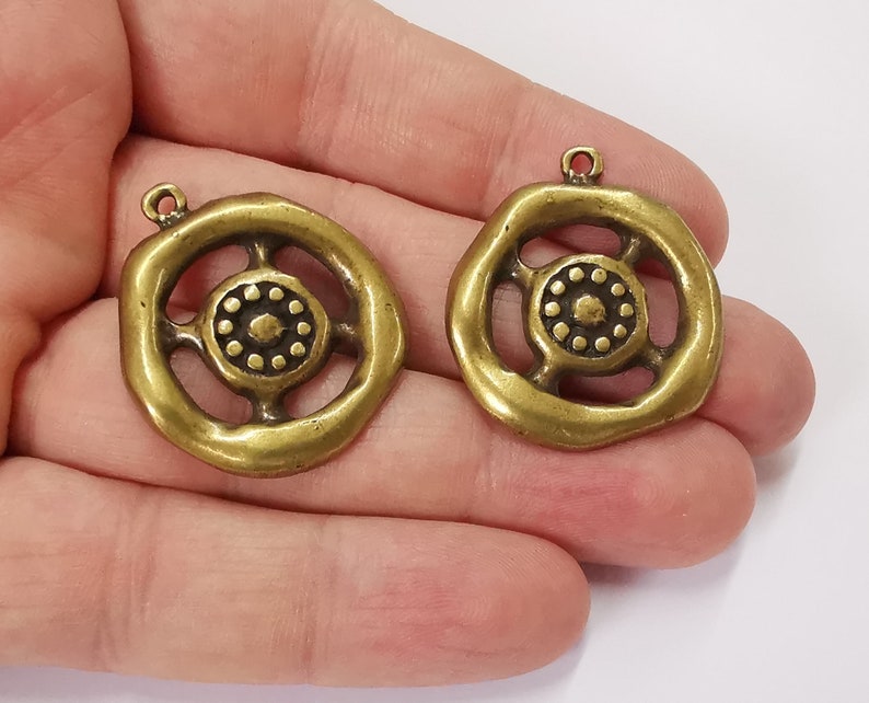 2 Antique bronze charms Antique bronze plated charms (29x24mm) G25224