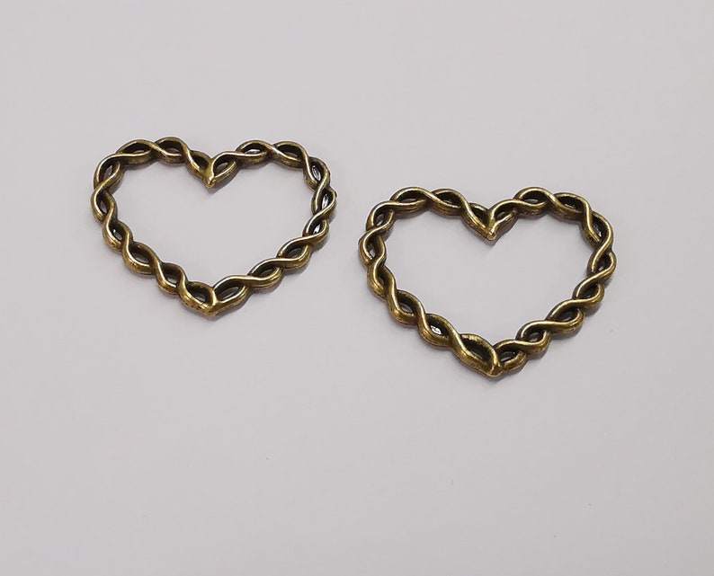 4 Twisted wire shape heart charms Antique bronze plated charms (33x27mm) G25255