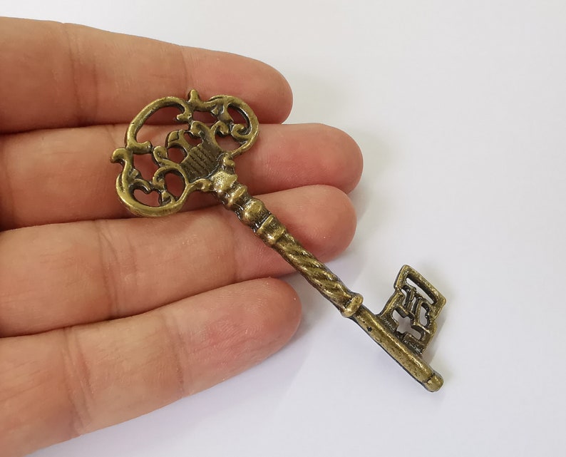 Key pendant Antique bronze plated charms (81x37mm) G25295