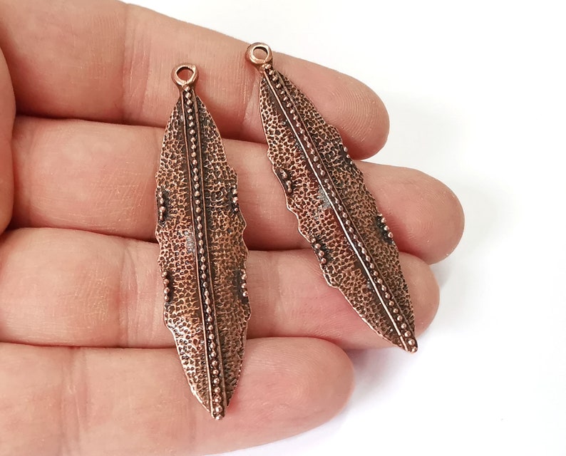 2 Leaf charms Antique copper plated charms (59x15mm) G25113