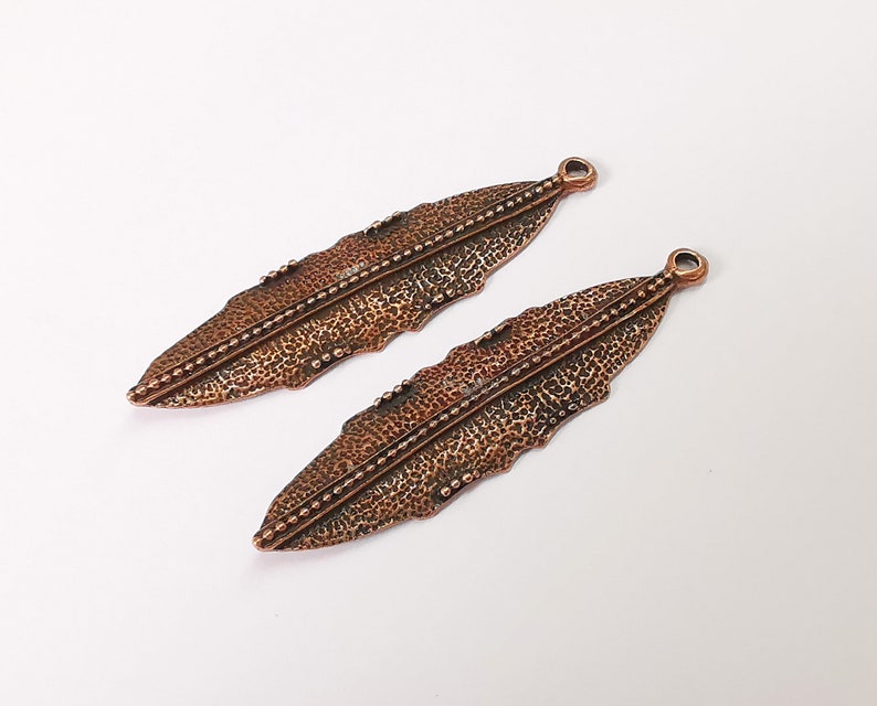 2 Leaf charms Antique copper plated charms (59x15mm) G25113