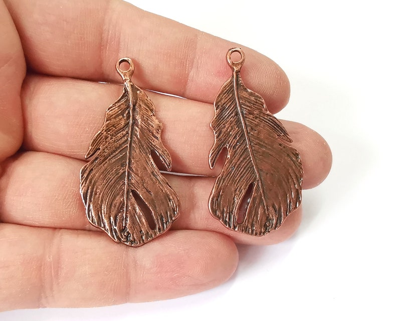 2 Feather charms Antique copper plated charms Double sided (47x25mm) G25116