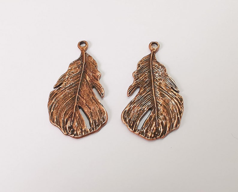 2 Feather charms Antique copper plated charms Double sided (47x25mm) G25116