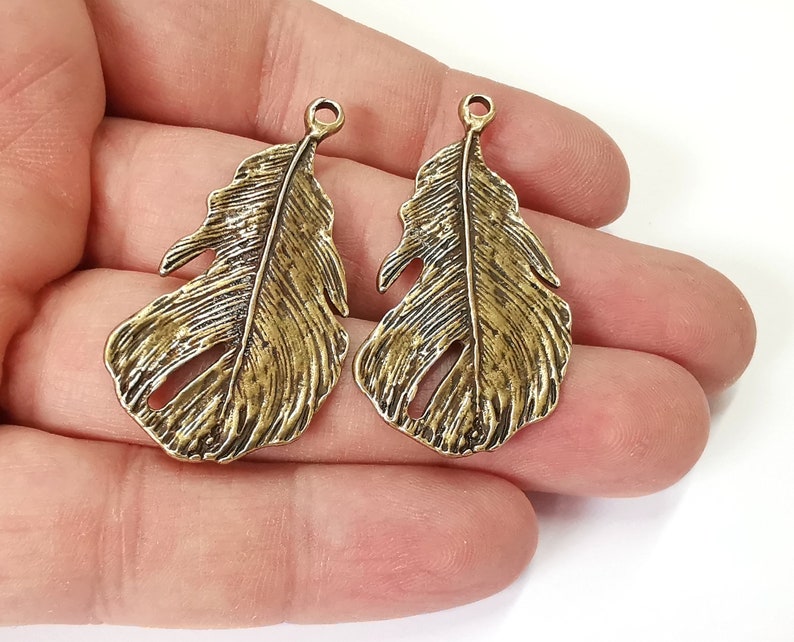 2 Feather charms Antique bronze plated charms Double sided (47x25mm) G25118