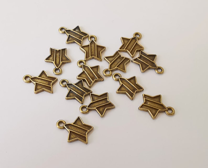 20 Star charms Antique bronze plated charms (14x11mm) G25132