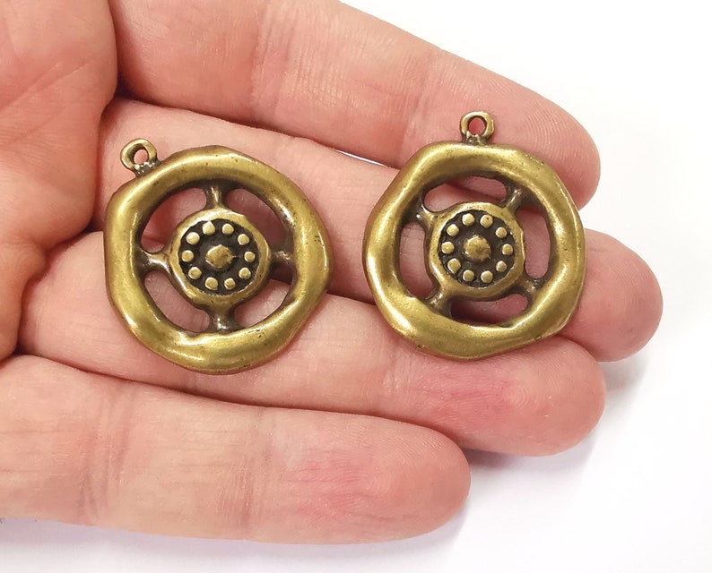 2 Antique bronze charms Antique bronze plated charms (29x24mm) G25224