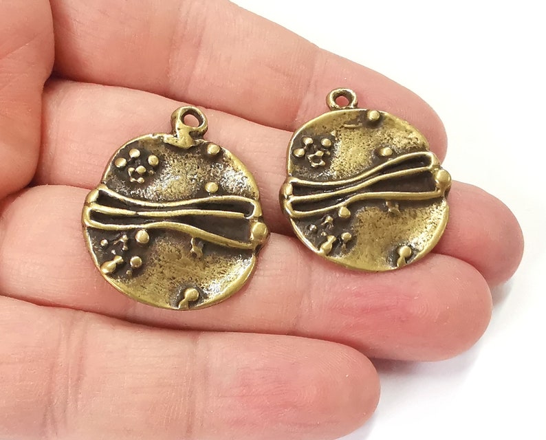 2 Ethnic round charms Antique bronze plated charms (27x22mm) G25225