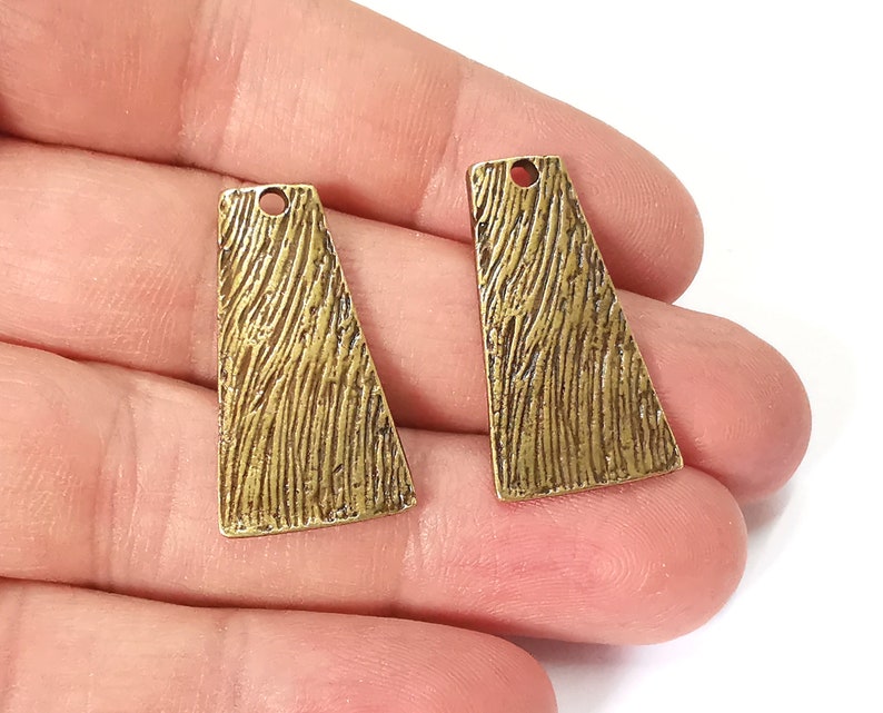 4 Brushed charms Antique bronze plated charms (25x11mm) G25231