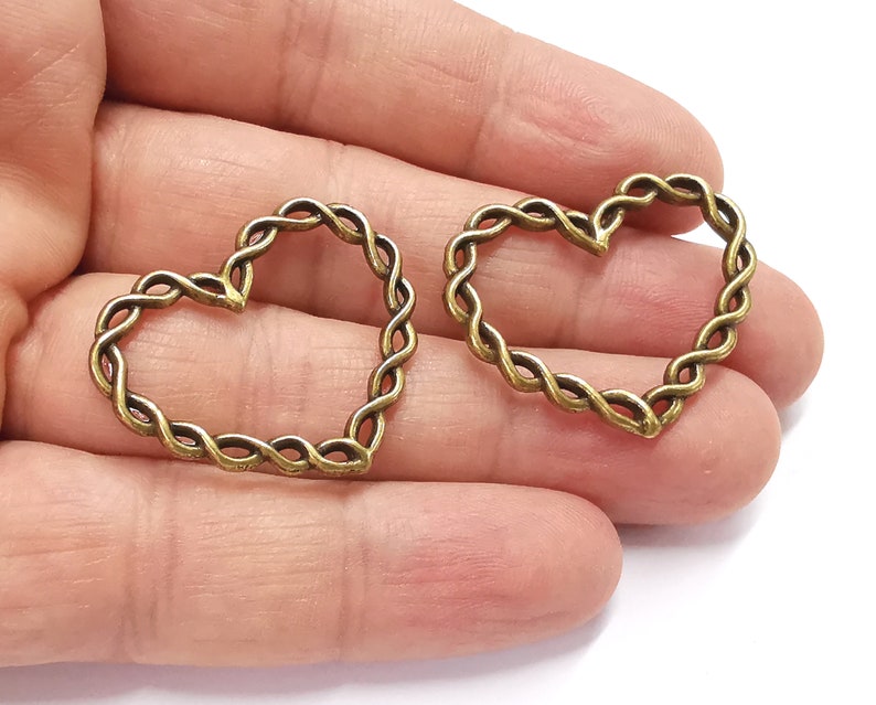 4 Twisted wire shape heart charms Antique bronze plated charms (33x27mm) G25255