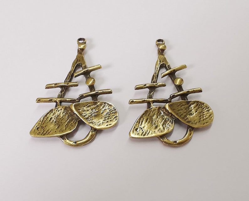 2 Antique bronze charms Antique bronze plated charms (53x34mm) G25266