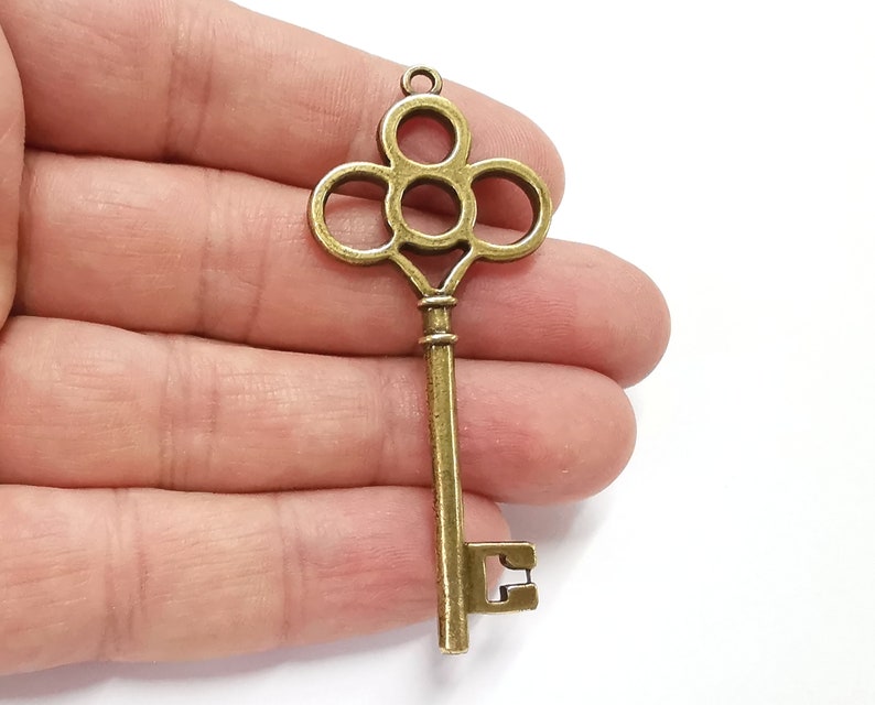 2 Key pendant Antique bronze plated pendant (67x28mm) G25275
