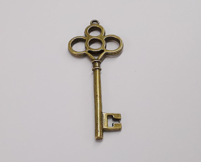 2 Key pendant Antique bronze plated pendant (67x28mm) G25275