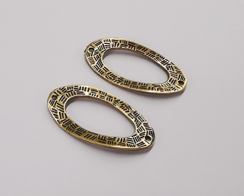 4 Wavy oval textured connector Double sided Antique bronze plated charms (35x17mm) G25278