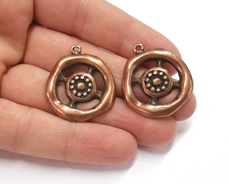 2 Antique copper charms Antique copper plated charms (34x29mm) G25280