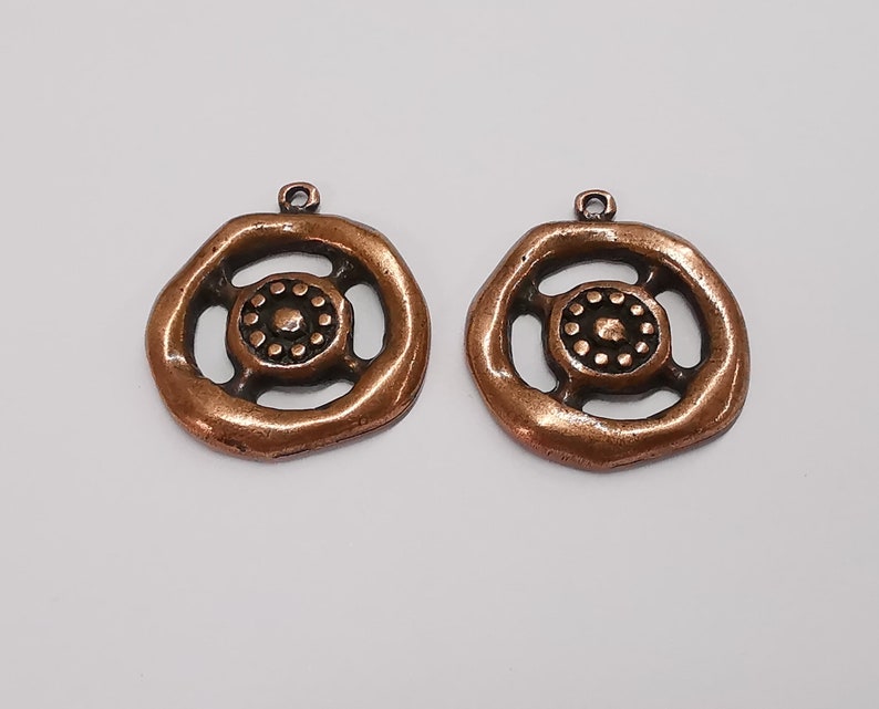 2 Antique copper charms Antique copper plated charms (34x29mm) G25280