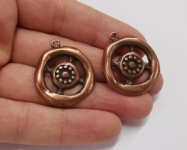 2 Antique copper charms Antique copper plated charms (34x29mm) G25280