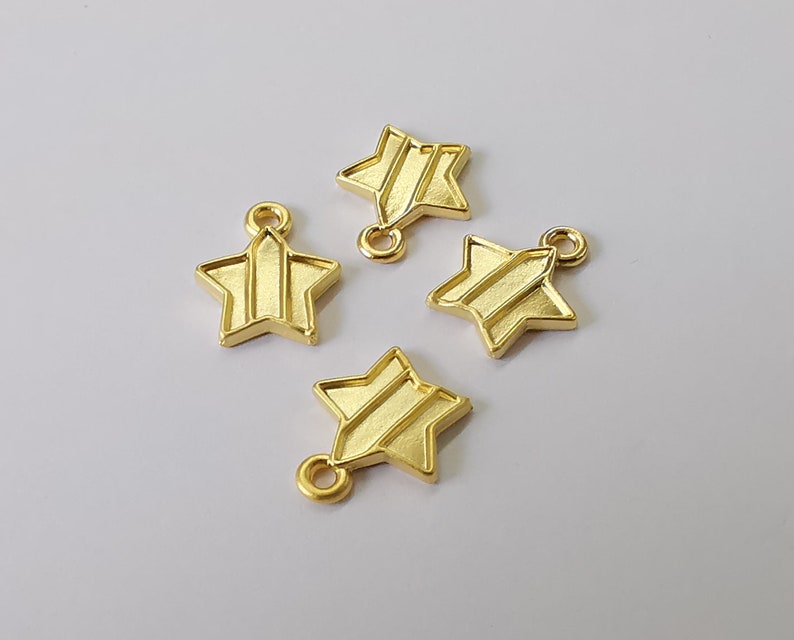 10 Star charms Gold plated charms (13x11mm) G25289