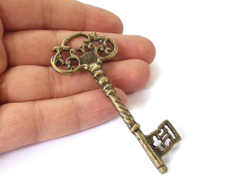 Key pendant Antique bronze plated charms (81x37mm) G25295