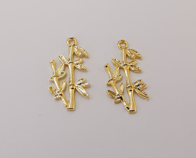 4 Bamboo plant leaf branch charms Shiny gold plated charms (29x14mm) G25581