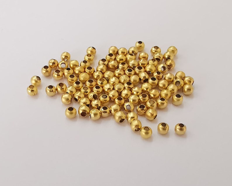 20 Round beads Gold plated beads (3mm) G25741