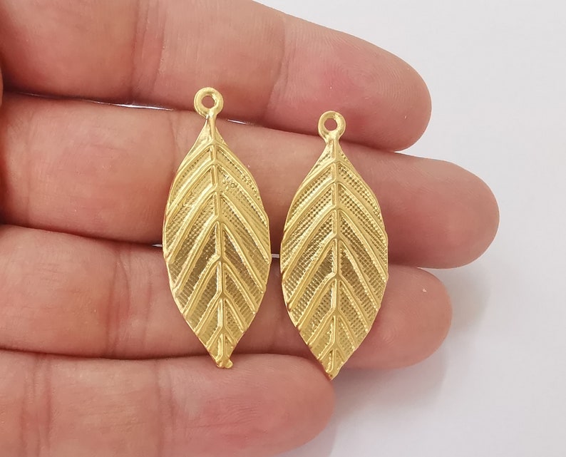 2 Leaf charms Gold Plated Charms (41x16mm) G25598