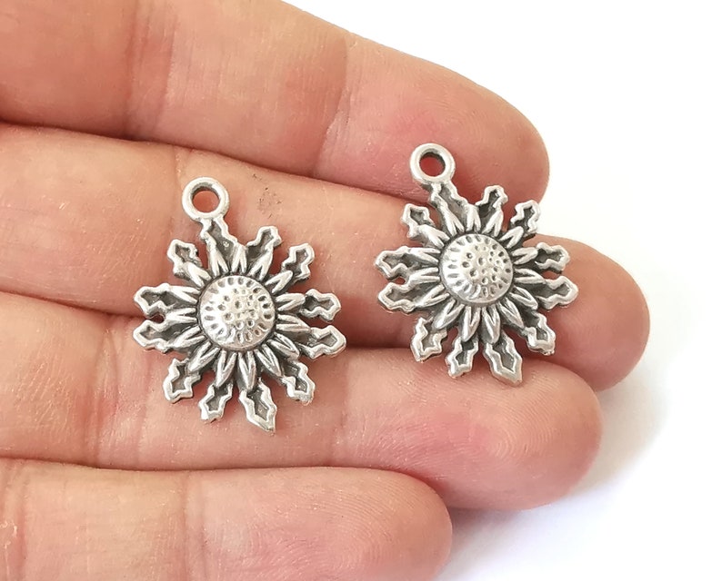 2 Sun charms Antique silver plated charms (28x21mm) G25371