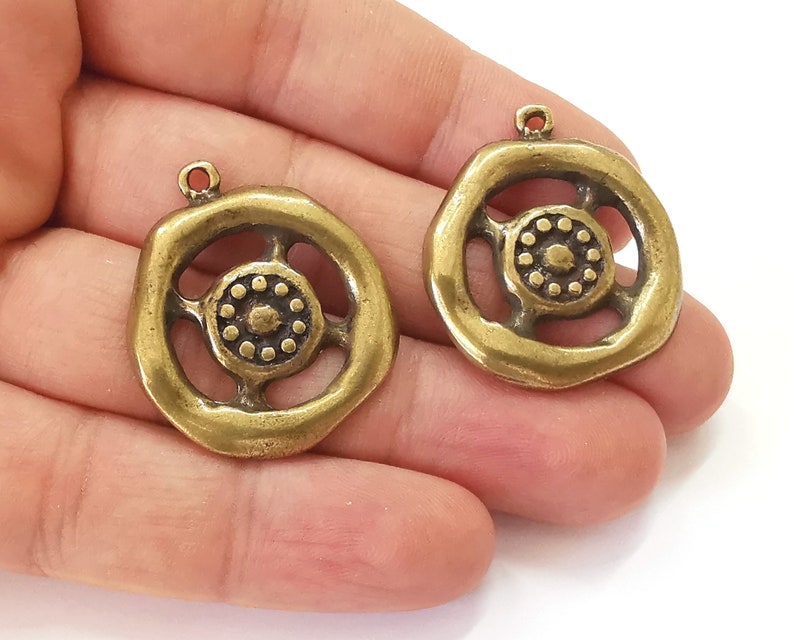 2 Antique bronze charms Antique bronze plated charms (34x30mm) G25675
