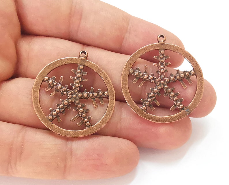 2 Snow flake charms Antique copper plated charms (36x32mm) G25690
