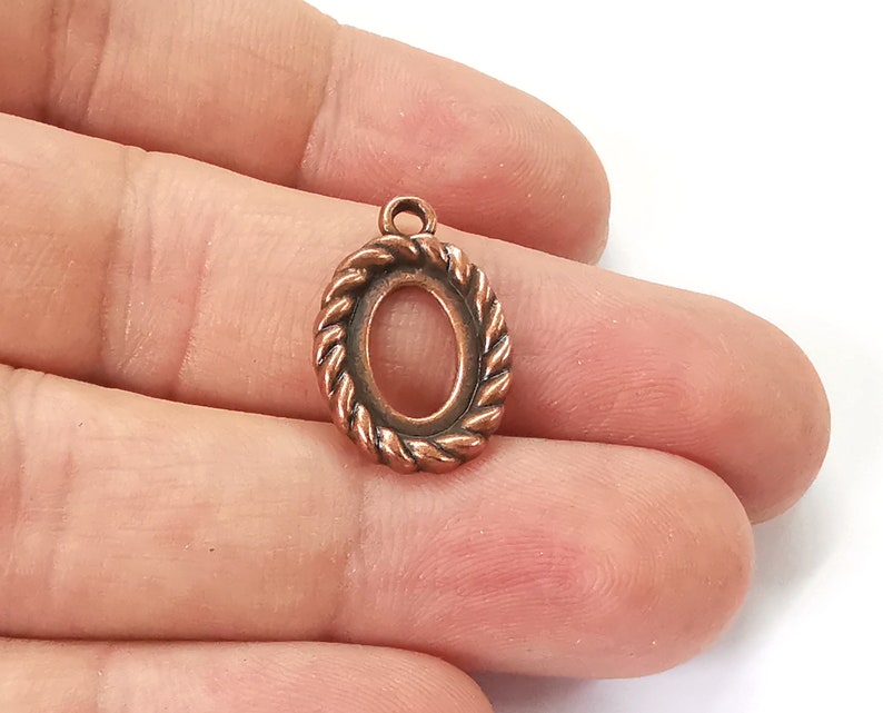 10 Twisted swirl bezel Charm base blank Antique copper plated 22x15mm (Blank Size 14x10mm) G25424
