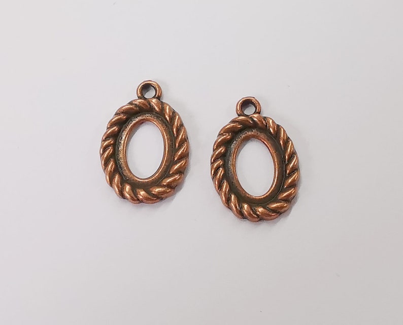 10 Twisted swirl bezel Charm base blank Antique copper plated 22x15mm (Blank Size 14x10mm) G25424