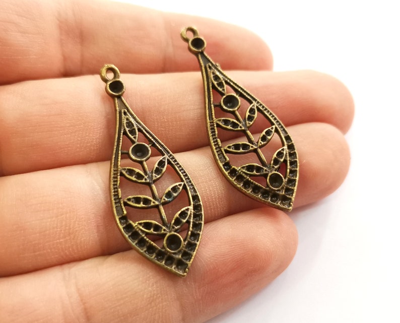 4 Leaf Charms Antique Bronze Plated Charms (44x16mm) G25483