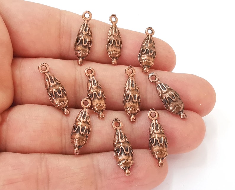 10 Antique copper charms Antique copper plated charms (22x7mm) G25566