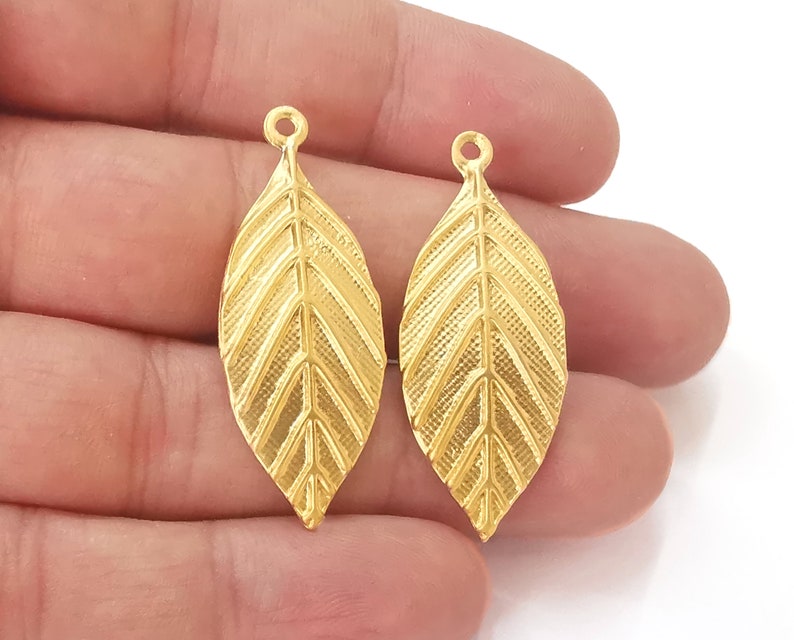 2 Leaf charms Gold Plated Charms (41x16mm) G25598