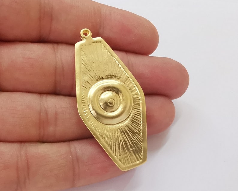 Ethnic charms Gold plated charms (55x26mm) G25747