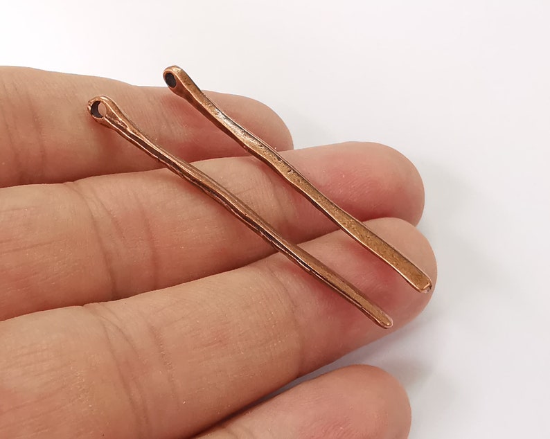 10 Spike charms Antique copper plated charms (52x4mm) G26000