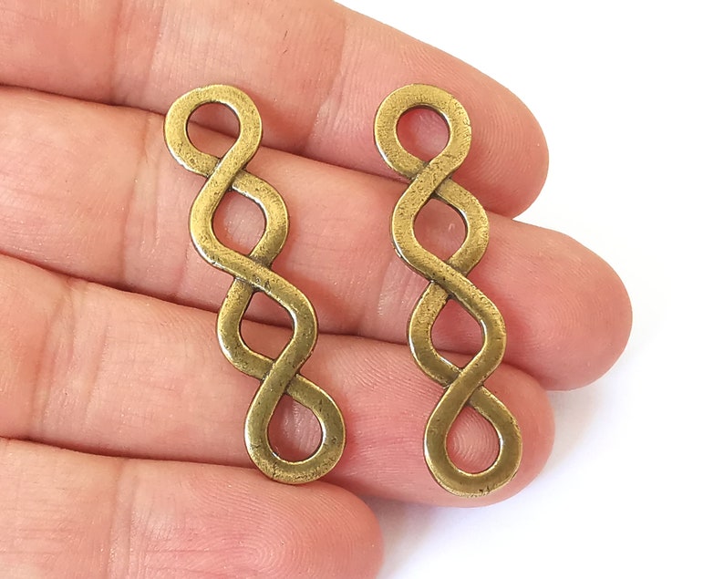 4 Twisted swirl charms connector Antique bronze plated charms (44x11mm) G26014
