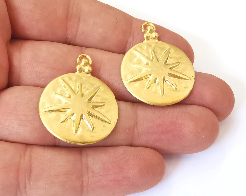 2 North star charms Gold plated charms (34x26mm) G26019