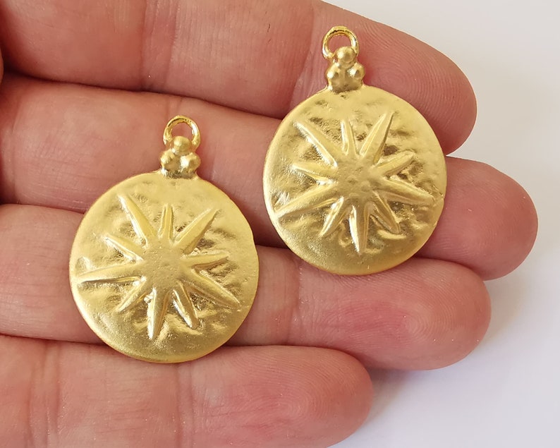2 North star charms Gold plated charms (34x26mm) G26019