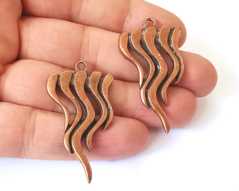 2 Antique copper charms Antique copper plated charms (47x26mm) G26025