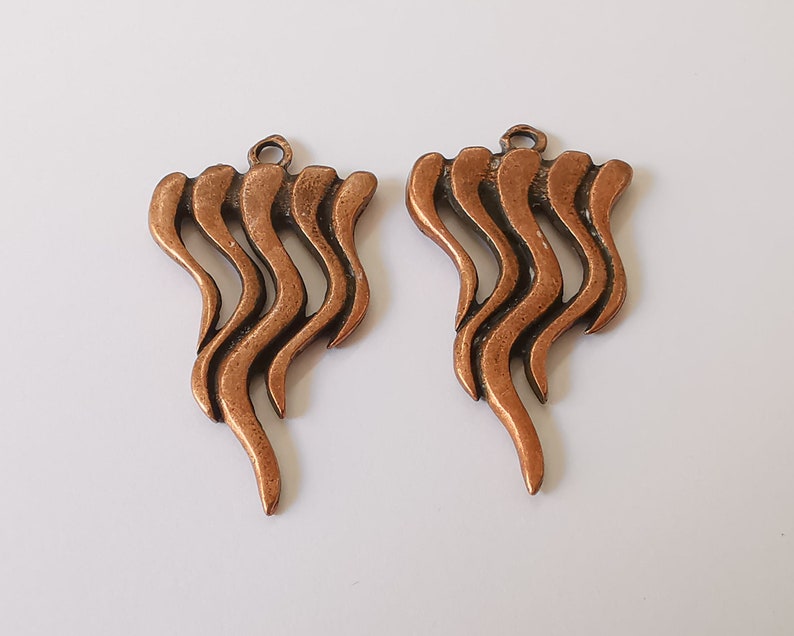 2 Antique copper charms Antique copper plated charms (47x26mm) G26025