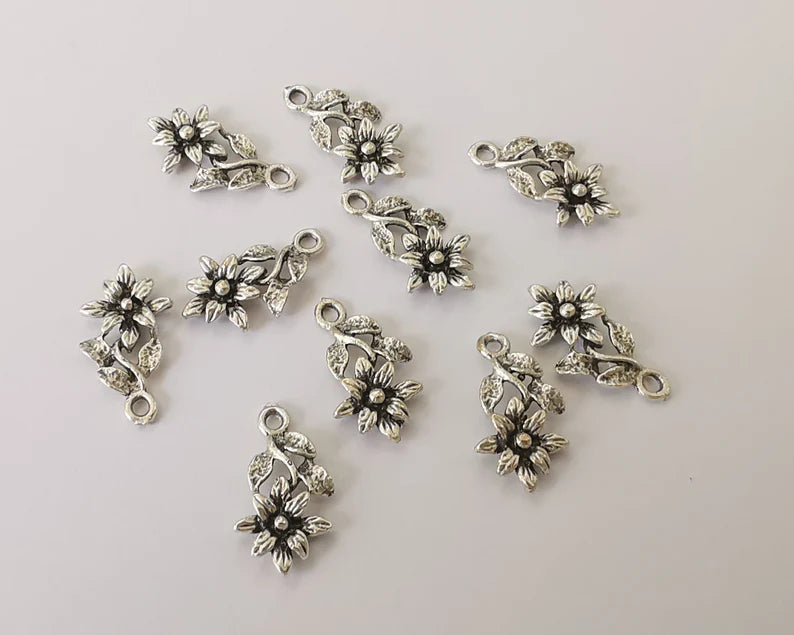 10 Flower charms Antique silver plated charms (18x10mm) G26054