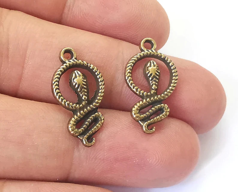 10 Snake charms Antique bronze plated charms (23x12mm) G26068