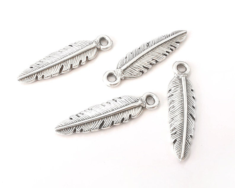 10 Feather charms Antique silver plated charms (32x8mm) G25982