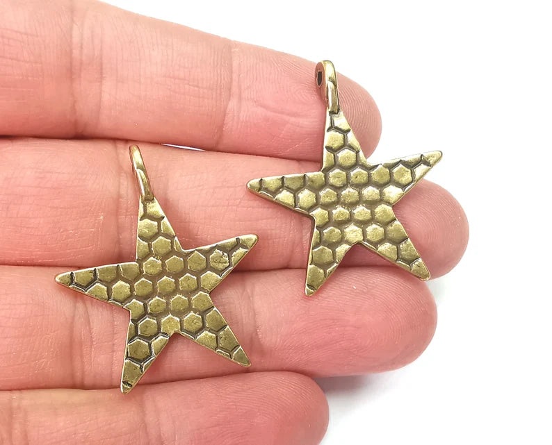 Star Textured Charms Antique Bronze Plated Charm (35x30mm) G27932
