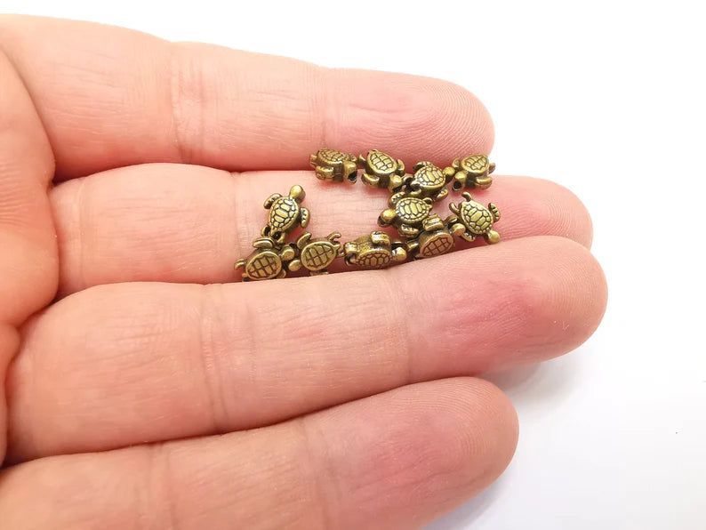 10 Turtle Beads Antique Bronze Plated Beads 9x6mm G29093