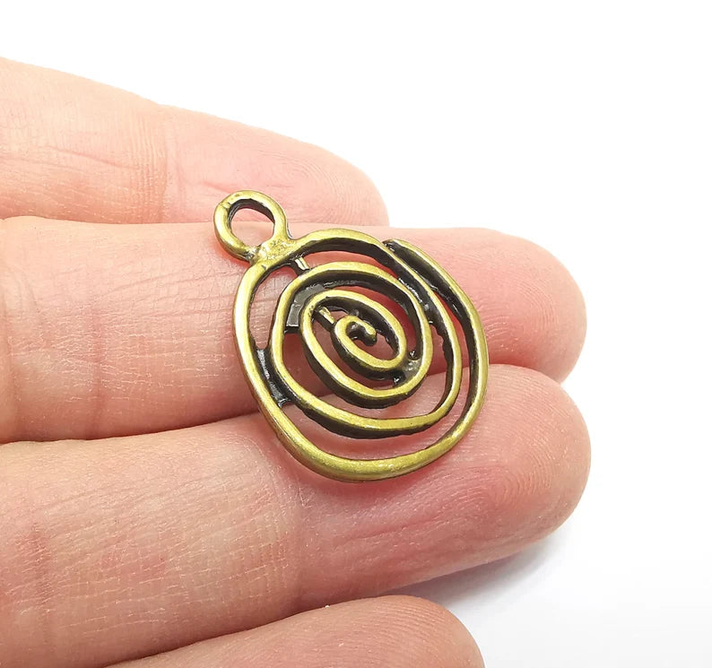 2 Swirl Charms Antique Bronze Plated (27x22mm) G29666