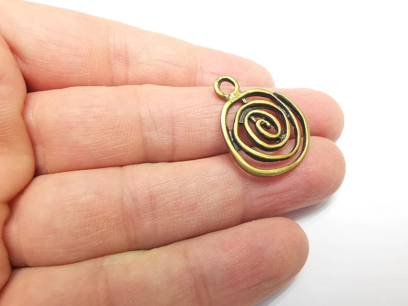 2 Swirl Charms Antique Bronze Plated (27x22mm) G29666