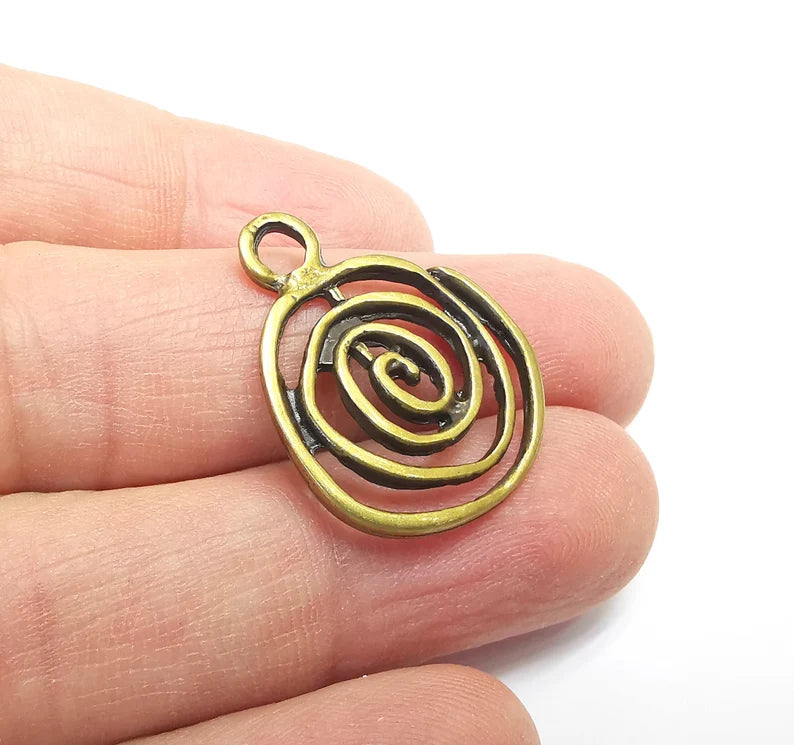 2 Swirl Charms Antique Bronze Plated (27x22mm) G29666